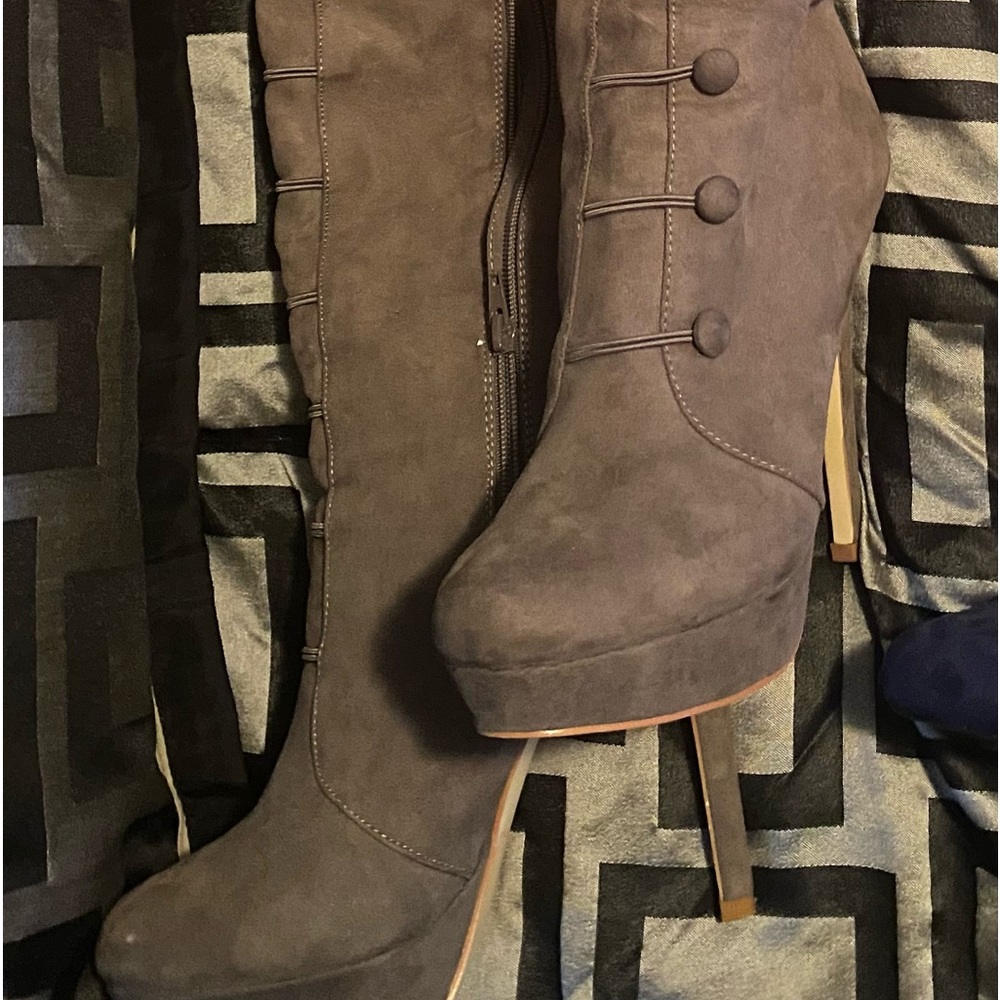 Thigh high, high heeled boots